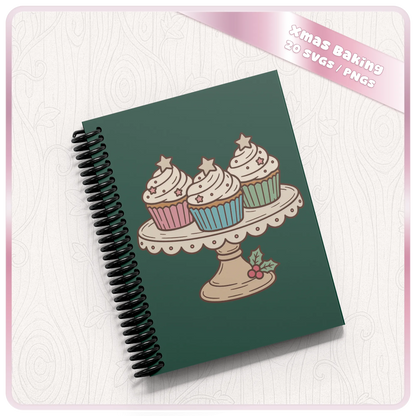 Christmas cupcake stand SVG and PNG clipart displayed on a dark green spiral notebook, showing a festive baking design for craft projects.
