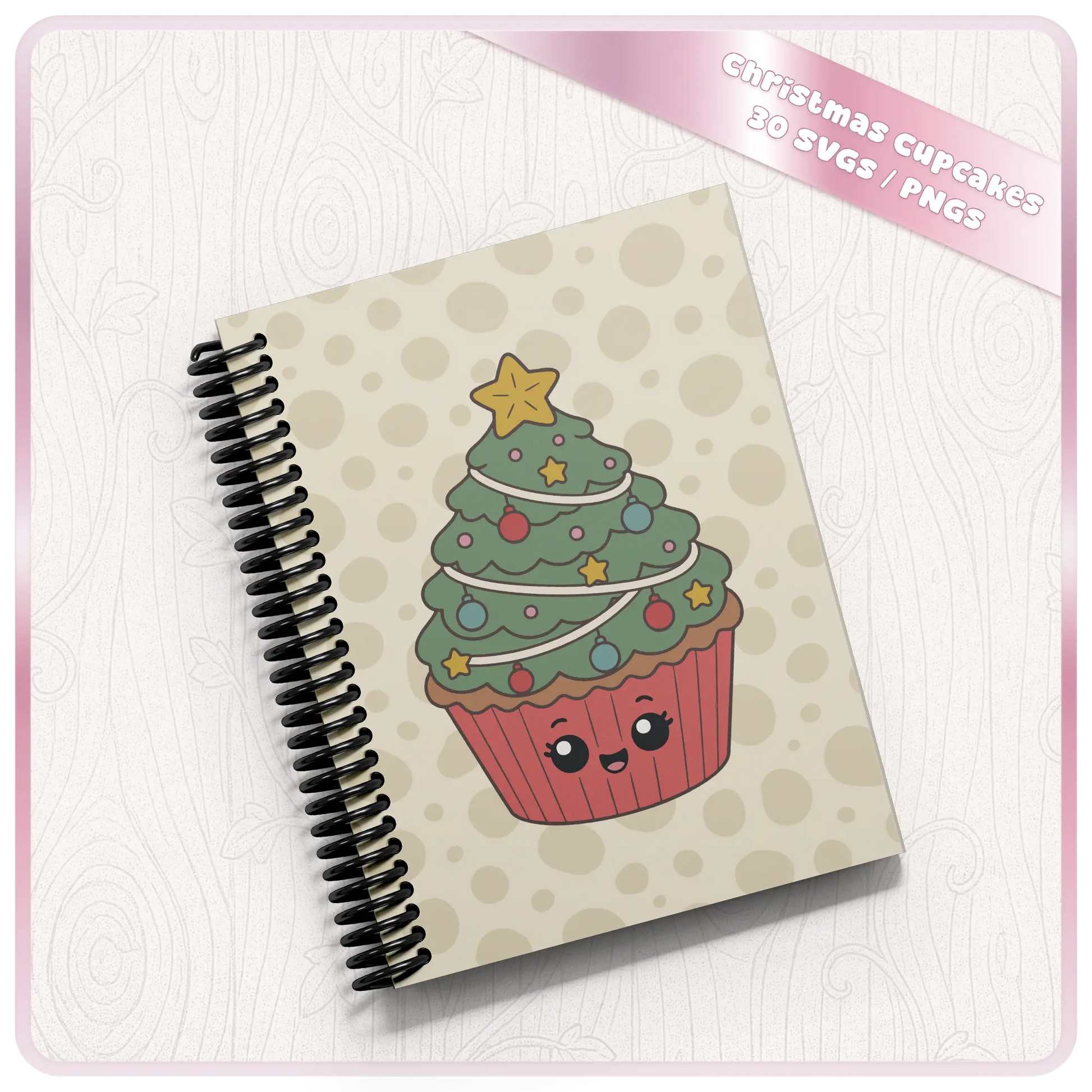 Christmas cupcake SVG and PNG mockup showing cute Christmas tree cupcake artwork on a spiral notebook with festive polka dot background.