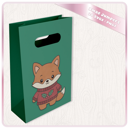 Kawaii Christmas fox SVG displayed on a green gift bag mockup, featuring a cute festive fox wearing a red Christmas jumper with holly decoration.
