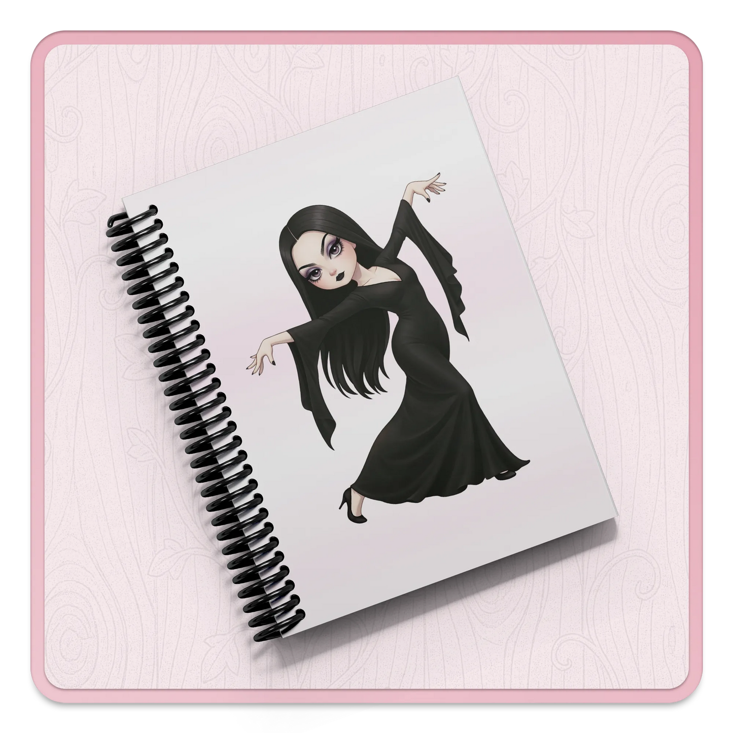 Notebook with a cartoon character on a pink background