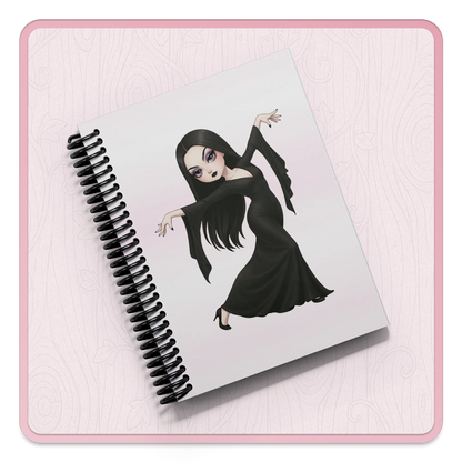 Notebook with a cartoon character on a pink background