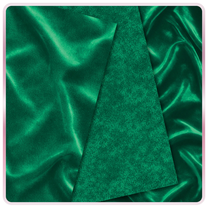 Seamless emerald velvet fabric texture with deep green tones and soft reflective sheen