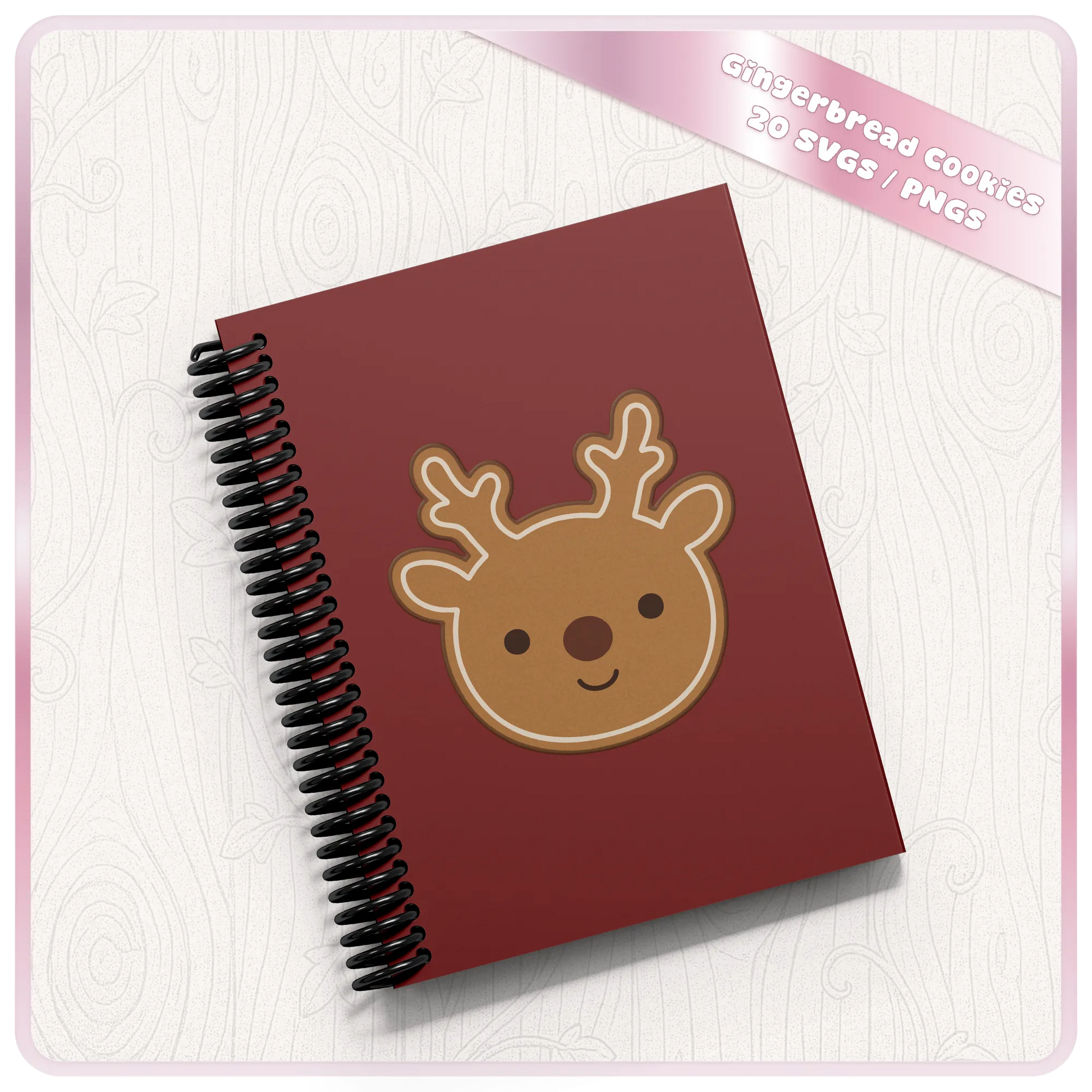Christmas reindeer gingerbread SVG displayed on a red spiral notebook mockup showing a festive craft project using the gingerbread cut file.