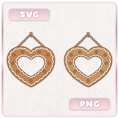 Gingerbread heart frame shown in SVG and PNG formats with white icing, chocolate buttons and rope hanger for Christmas craft projects.