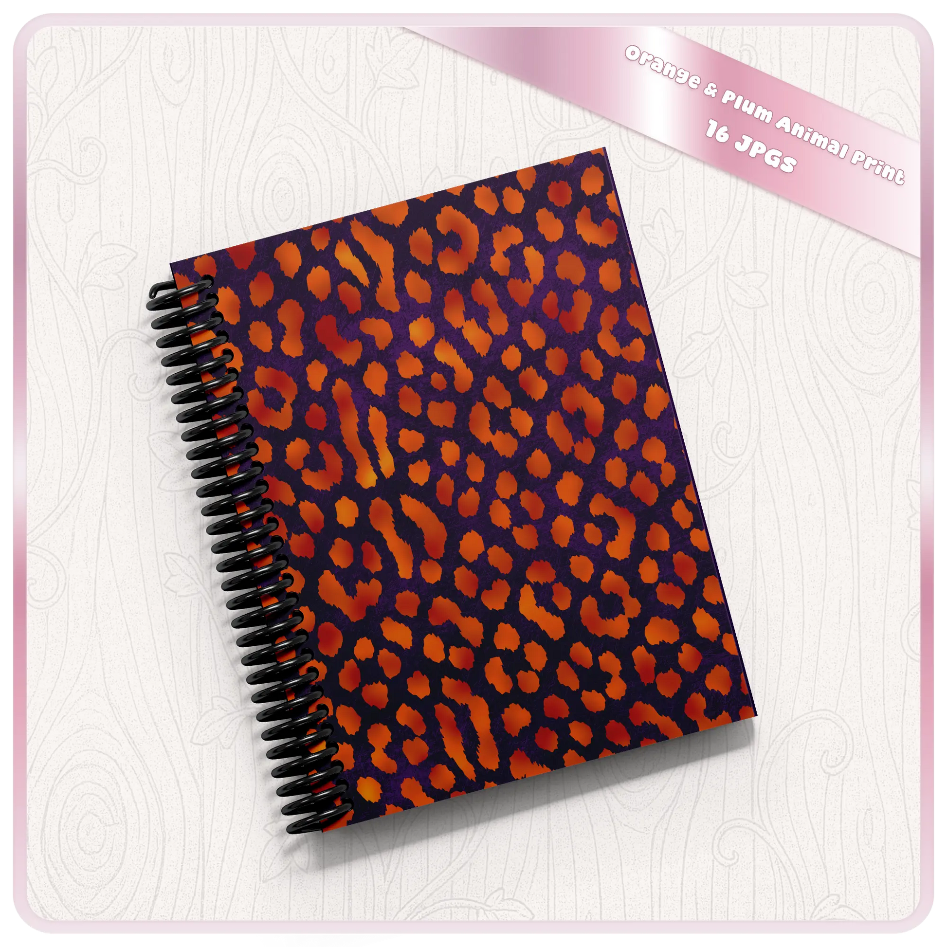 Notebook mockup featuring orange and plum leopard seamless pattern cover design